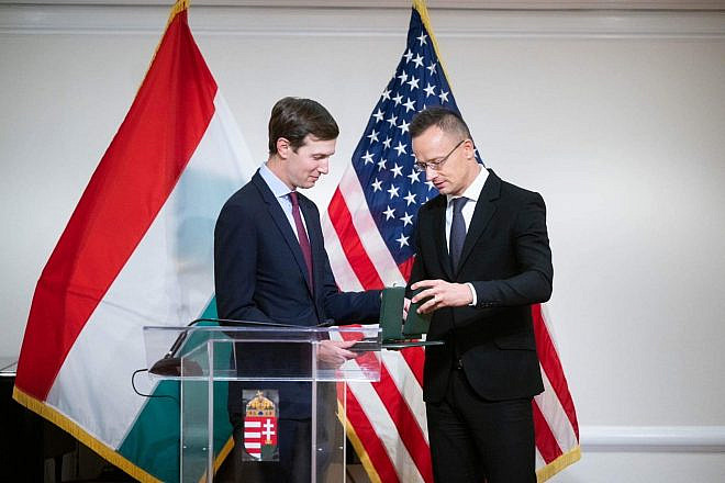 Former White House Senior Advisor Jared Kushner receives the order of Merit of Hungary from Hungarian Foreign Minister Peter Szijjarto in New York on Thursday. Courtesy Hungarian Mission to the United Nations.
