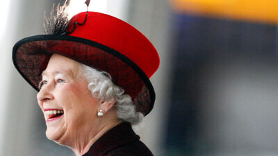 Queen Elizabeth II smiles during a visit in London on March 14, 2008. Credit: Alessia Pierdomenico/Shutterstock.