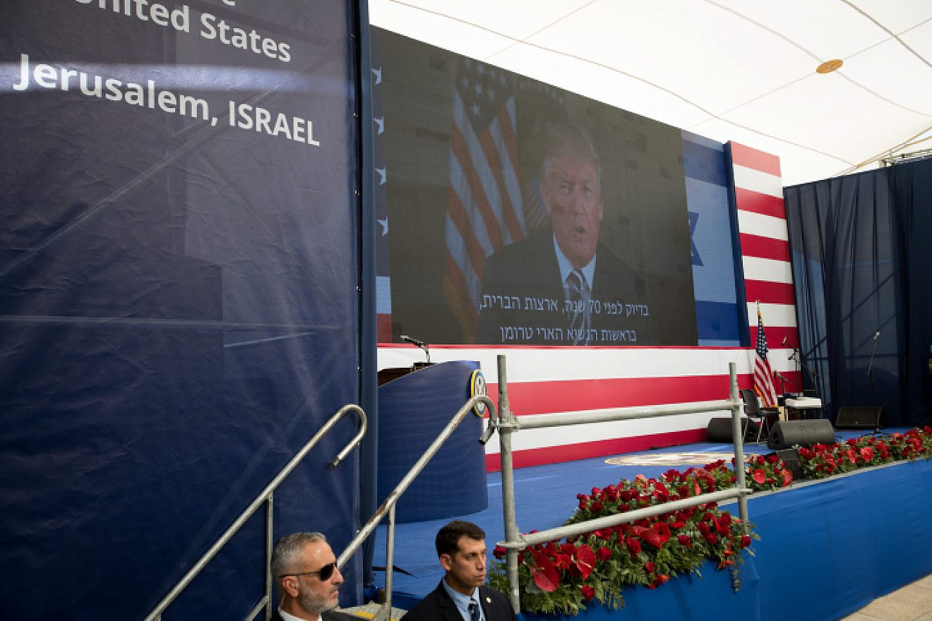 Then-President Donald Trump speaks on a video screen during the opening ceremony of the U.S. Embassy in Jerusalem, May 14, 2018. Photo by Yonatan Sindel/Flash90.
