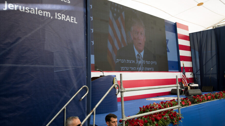 Then-President Donald Trump speaks on a video screen during the opening ceremony of the U.S. Embassy in Jerusalem, May 14, 2018. Photo by Yonatan Sindel/Flash90.