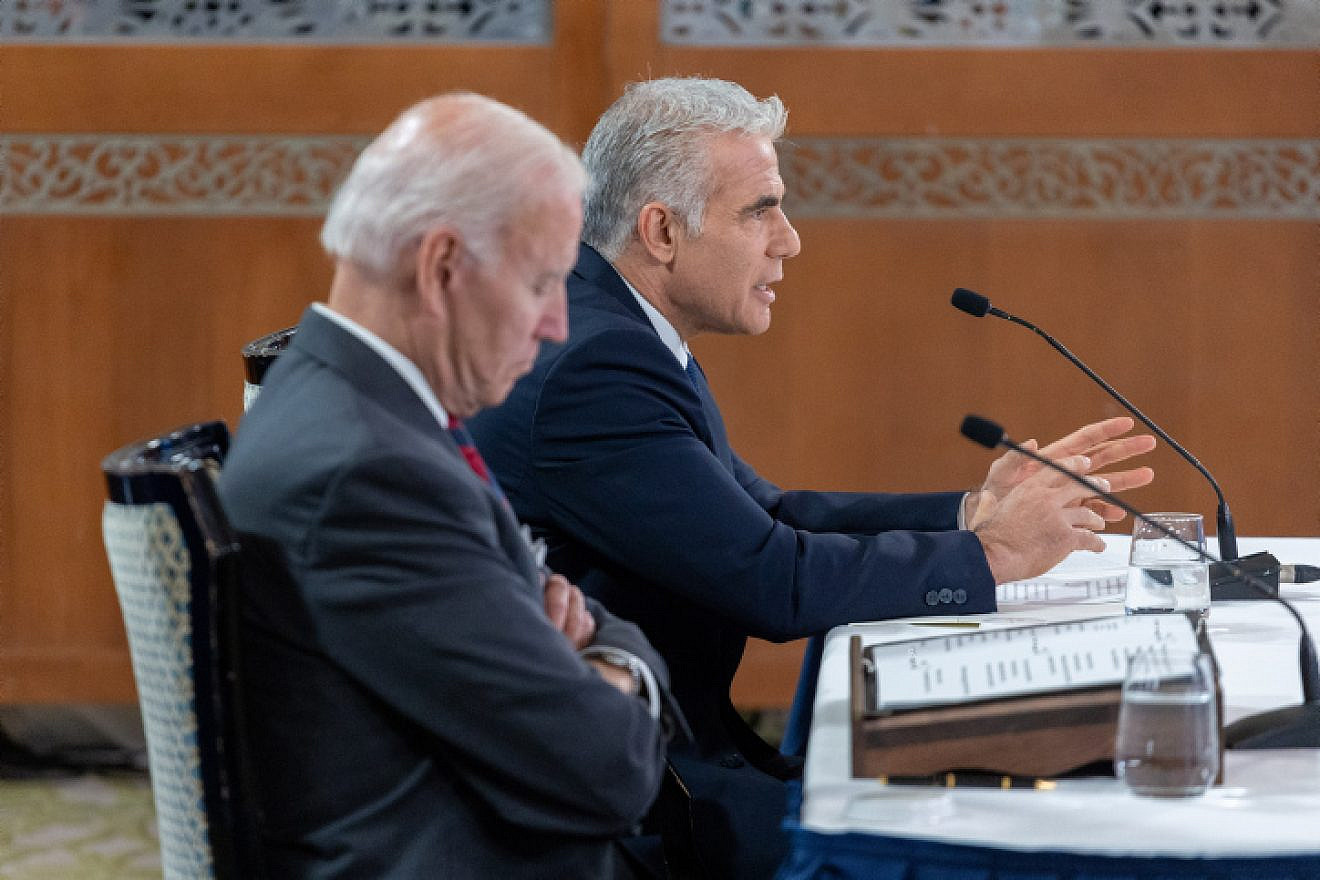 U.S. President Joe Biden holds a press conference with then-interim Israeli Prime Minister Yair Lapid in Jerusalem, July 14, 2022. Photo by Emil Salman/POOL.