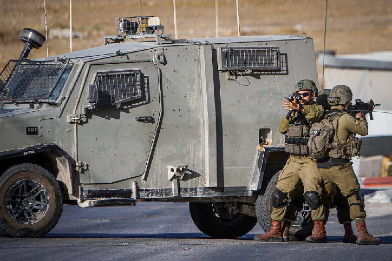 Israeli security forces conduct a search operation following a shooting in the village of Salem, near Nablus, known in Israel as Shechem, on Oct. 2, 2022. Photo by Nasser Ishtayeh/Flash90.