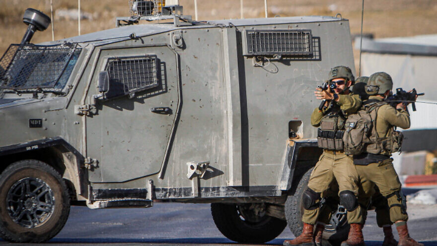 Israeli security forces conduct a search operation following a shooting in the village of Salem, near Nablus, known in Israel as Shechem, on Oct. 2, 2022. Photo by Nasser Ishtayeh/Flash90.
