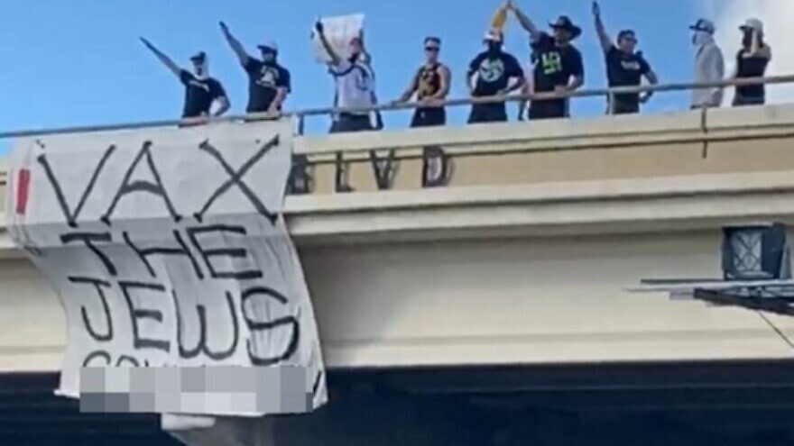 A banner hung by Goyim Defense League activists from an overpass in Austin, Texas, October 2021. Source: ADL.