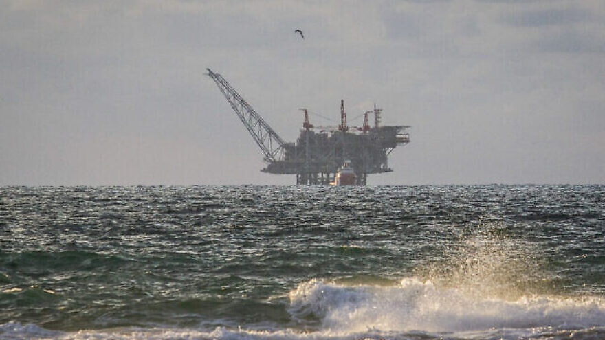 Israel's Leviathan gas field processing rig as seen from the Dor Habonim Beach Nature Reserve, January 1, 2020. Credit: Flash90.