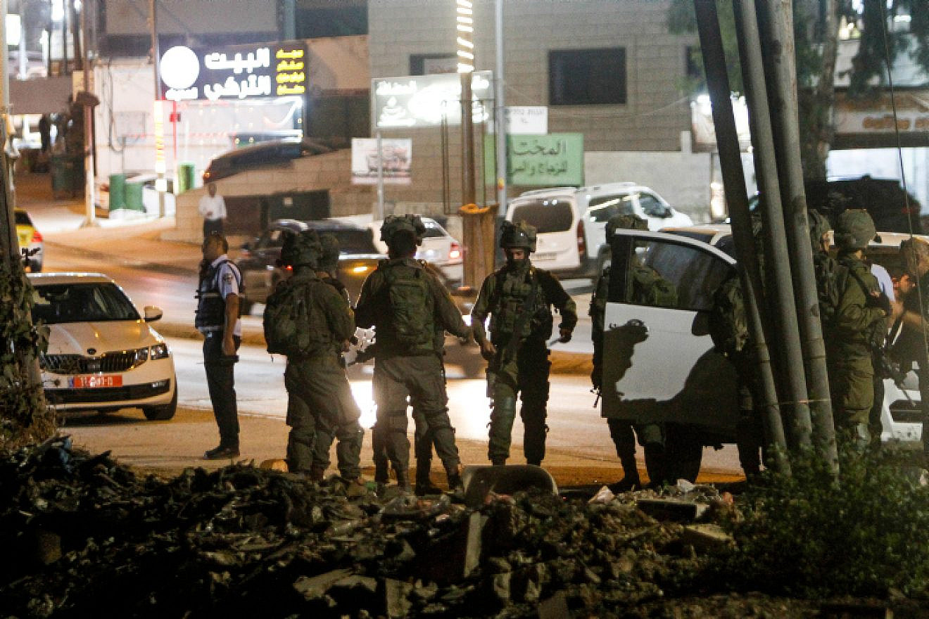 Security personnel secure the scene where Israeli soldiers shot a suspect in a vehicular attack, in Huwara, near Nablus, Sept. 22, 2022. Credit: Nasser Ishtayeh/Flash90
