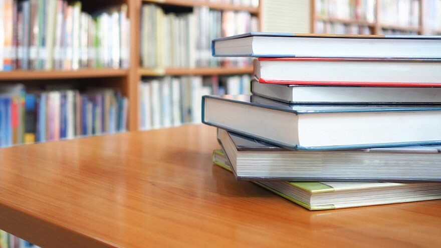 A stack of books. Photo: jakkaje879/Shutterstock