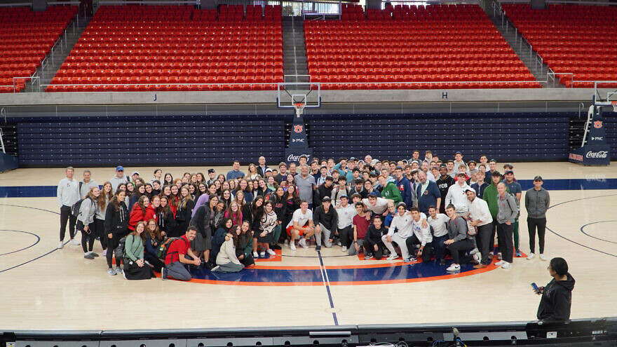 NCSY participants at the Auburn Tigers' court, with Coach Bruce Pearl in center. Credit: NCSY.