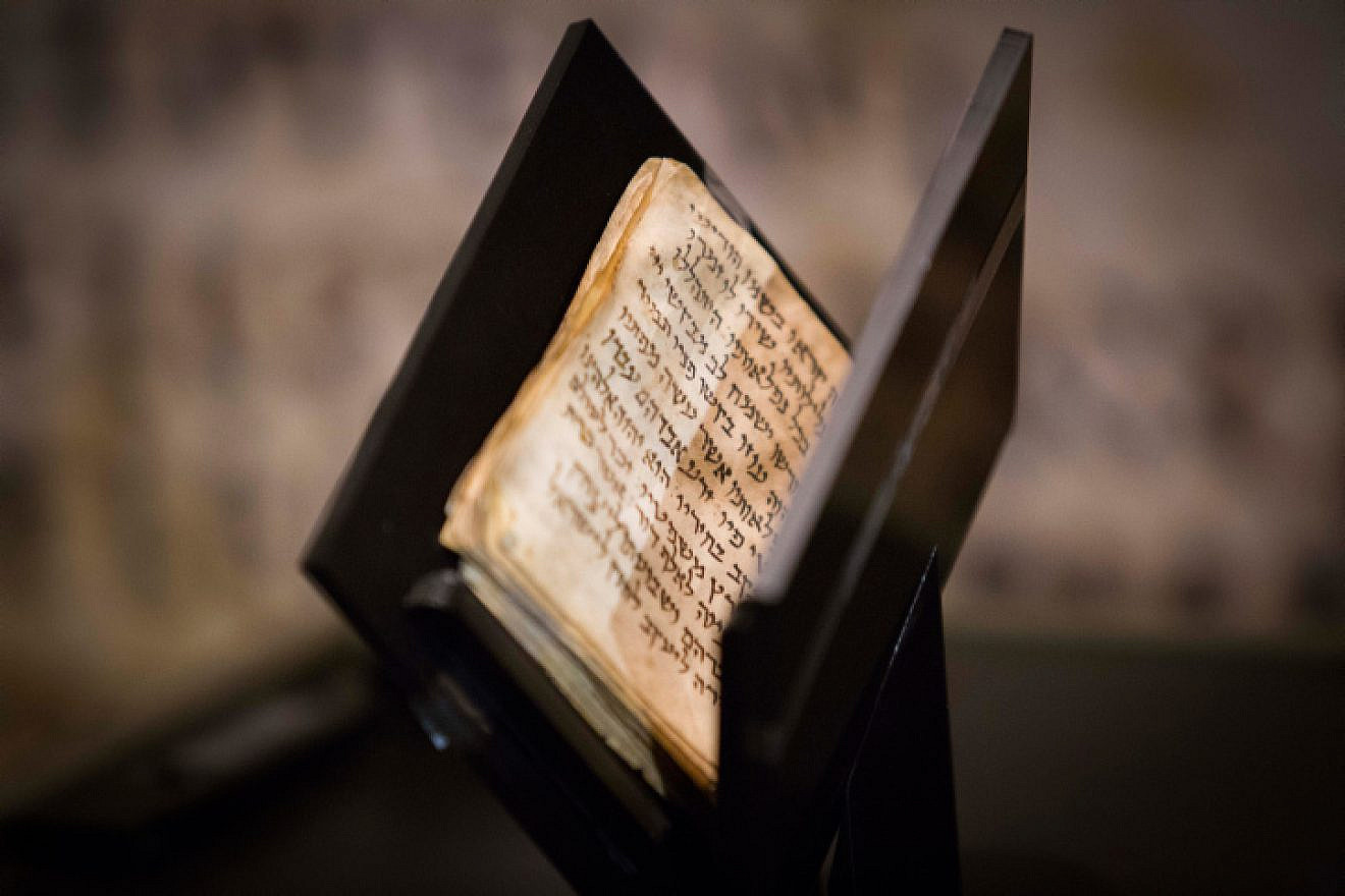 A 1,200-year-old Jewish prayer book, or siddur, is displayed at the Bible Lands Museum in Jerusalem on Sept. 18, 2014. Originating from the Middle East, the 50-page-long book written in Hebrew is the oldest known manuscript of Jewish prayers. Noam Revkin Fenton/Flash90.