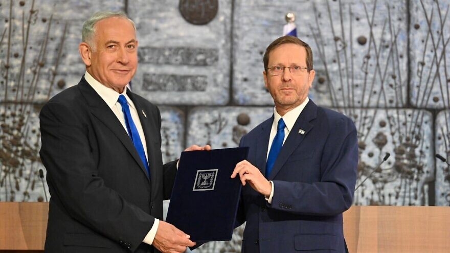 Israeli President Isaac Herzog (right) tasks opposition leader Benjamin Netanyahu with forming the country's next governing coalition, Nov. 13, 2022. Credit: Kobi Gideon/GPO.