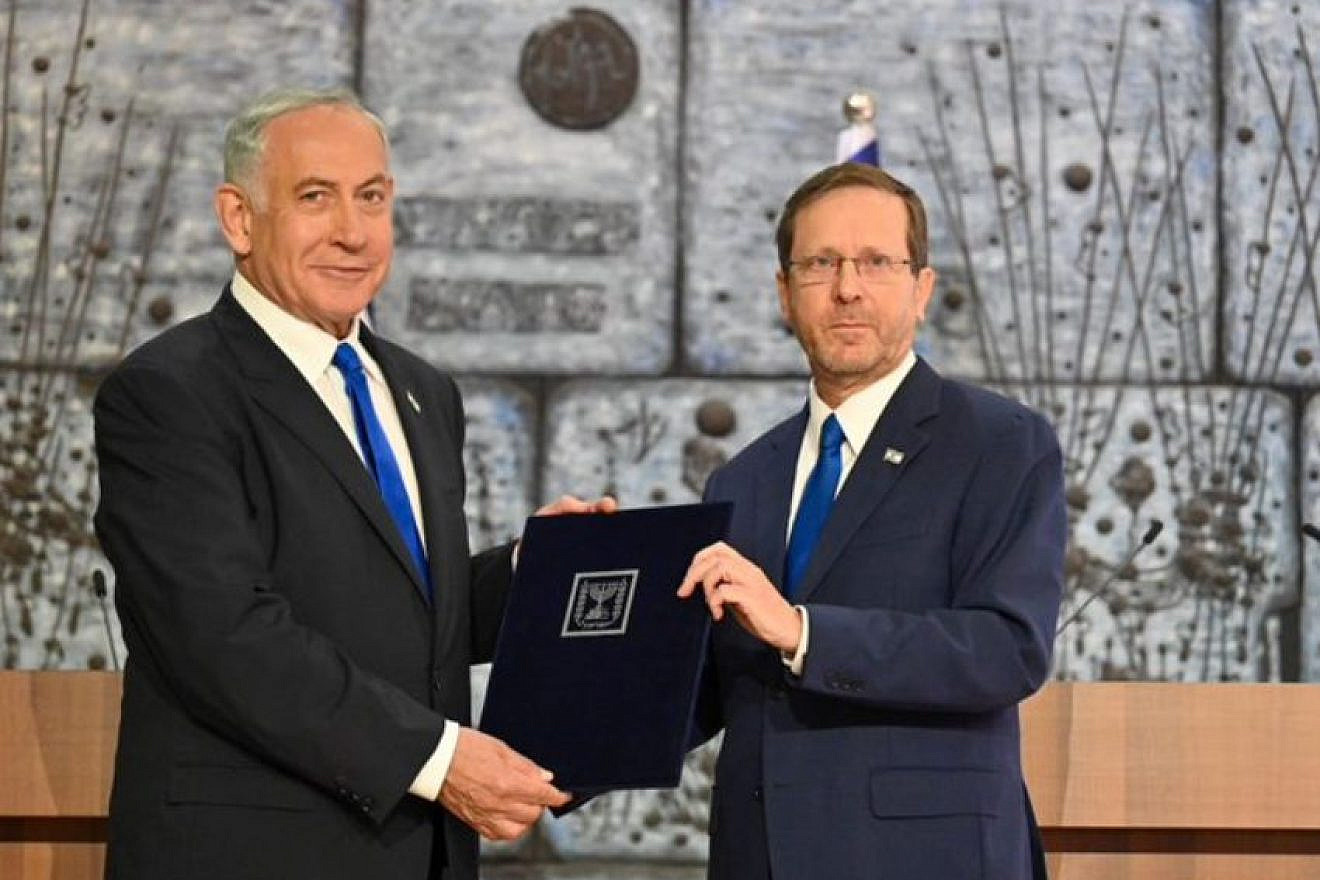 Israeli prime minister-designate Benjamin Netanyahu accepts the mandate to form a government from Israeli President Isaac Herzog, Nov. 13, 2022. Photo by Kobi Gideon/GPO.