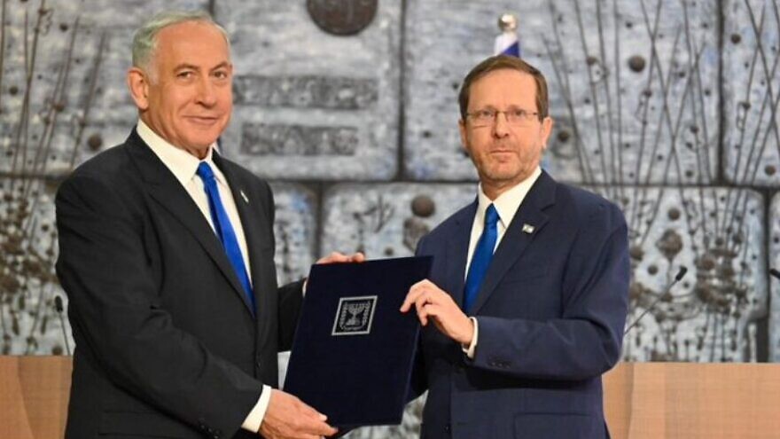 Prime Minister-designate Benjamin Netanyahu accepts the mandate to form a government from Israeli President Isaac Herzog, Nov. 13, 2022. Photo by Kobi Gideon/GPO.