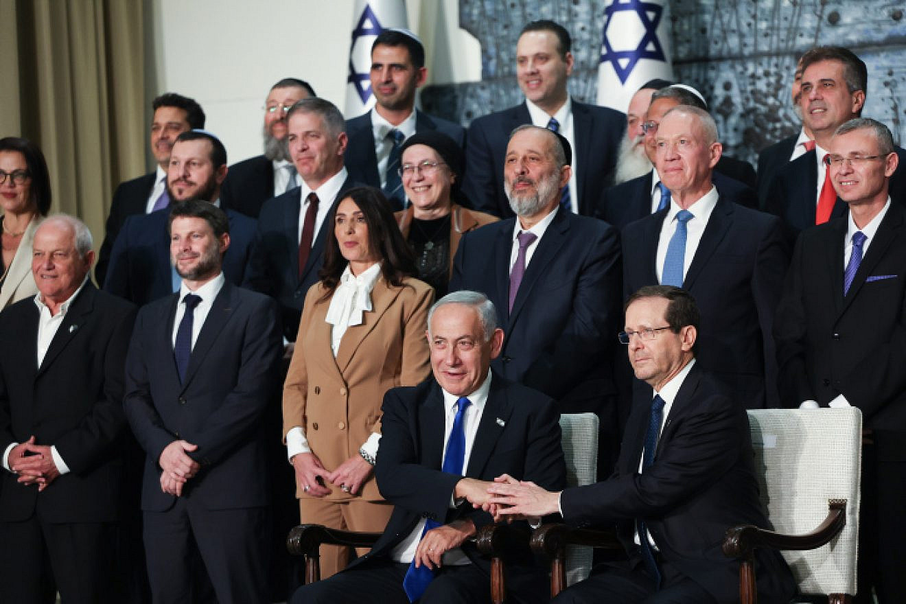 The new Israeli government, headed by Prime Minister Benjamin Netanyahu, poses for a group photo at the President's Residence in Jerusalem, Dec. 29, 2022. Photo by Yonatan SIndel/Flash90.