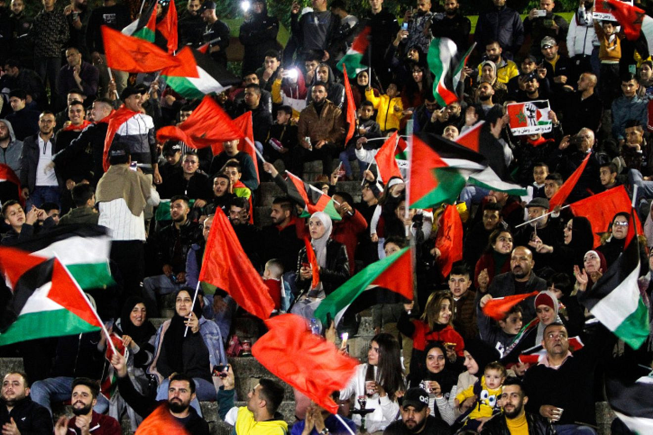 Palestinian supporters of Morocco celebrate the Qatar 2022 World Cup quarter-final match between Morocco and Portugal, in Nablus, Dec. 10, 2022.  Photo by Nasser Ishtayeh/Flash90.