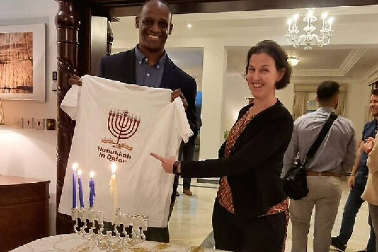 U.S. Ambassador to Qatar Timmy Davis (left) and Israeli diplomat Iris Ambor at a Hanukkah candle-lighting ceremony at the US Embassy in Doha, Dec. 20, 2022. Photo courtesy of the Israeli Foreign Ministry.
