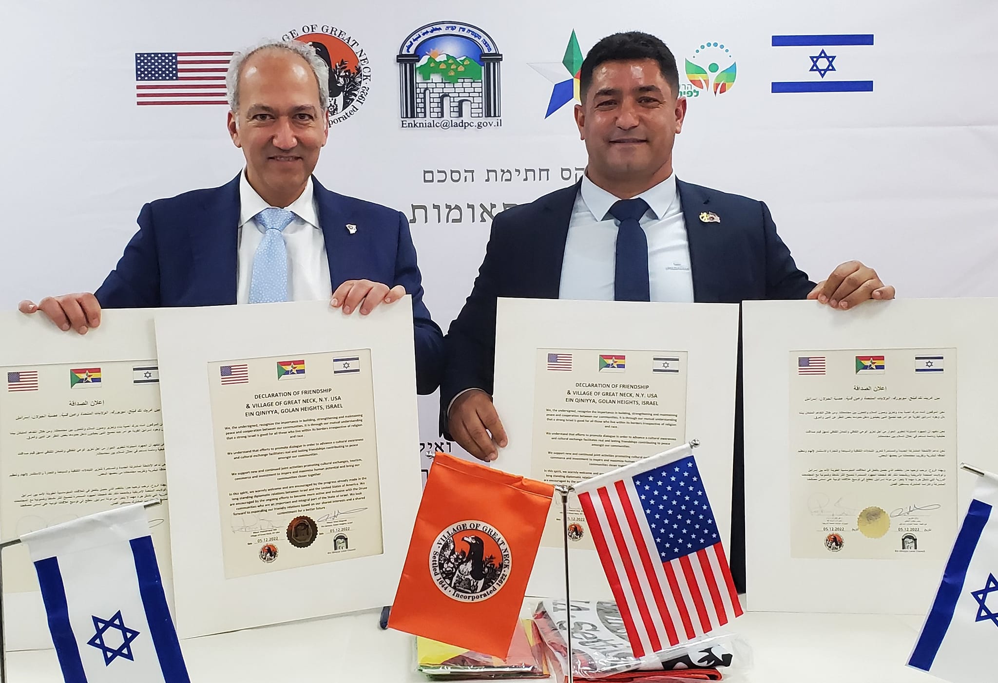 Great Neck, New York, Mayor Dr. Pedram Bral (left) and Ein Qiniyye Mayor Wael Mugrabi pose after signing a friendship and cooperation agreement last week. Courtesy of the Heartland Initiative.
