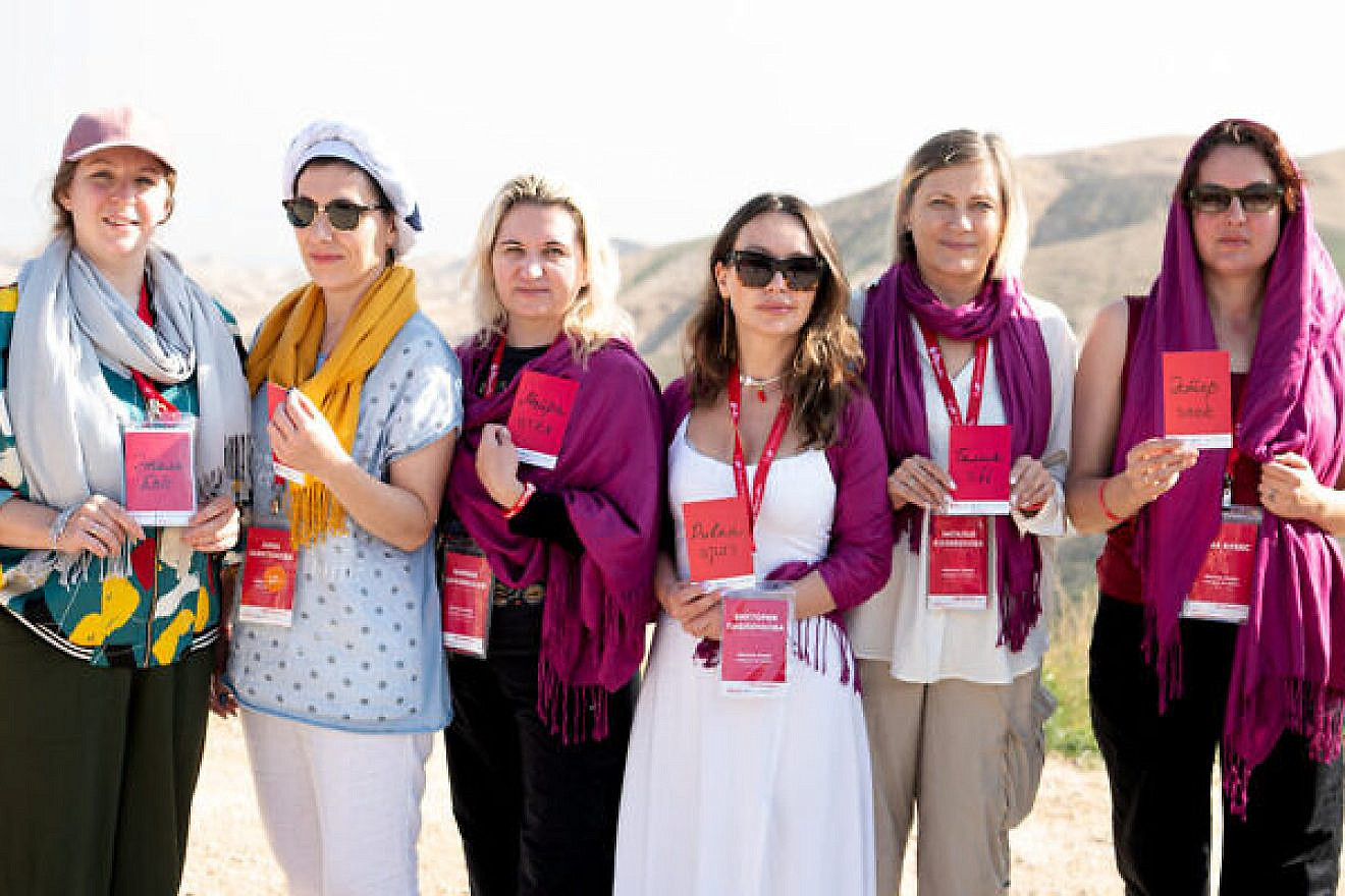 Women from the group pose with their newly selected ‘Jewish name’ on top of Masada in southern Israel. Photo by Aviram Valdman/Momentum.