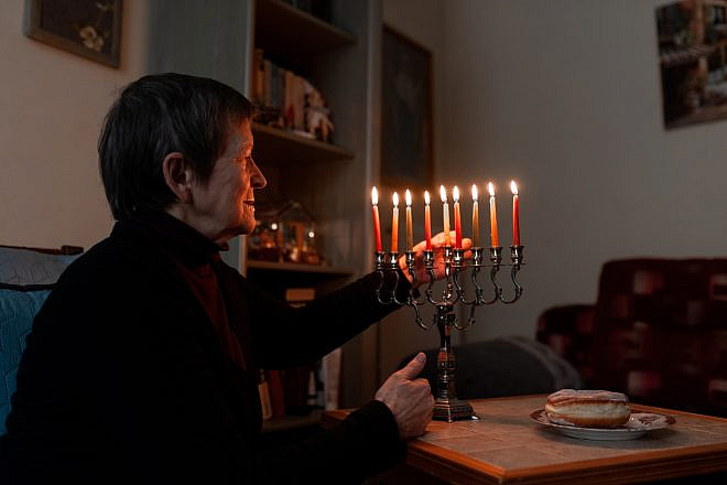 Galina Kovalenko,  one of more than 40,000 Jews in Ukraine currently cared for by the American Jewish Joint Distribution Committee (JDC) as part of their Ukraine crisis response efforts, celebrates Hanukkah in her home in of Lviv, Ukraine. Credit: Yura Malenko.
