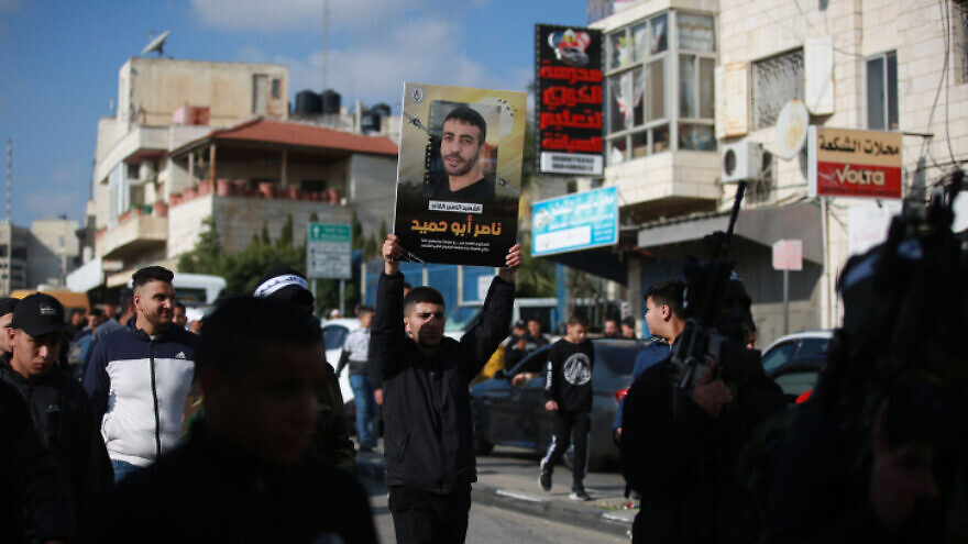 Palestinians take part in a protest in Ramallah following the death of security prisoner Nasser Abu Hamid, Dec. 20, 2022. Photo by stringer/FLASH90.