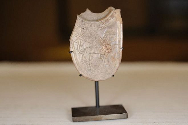 Part of an ancient Assyrian incense spoon recently handed over to the Palestinian Authority by U.S. officials. Source: Manhattan District Attorney's Office.