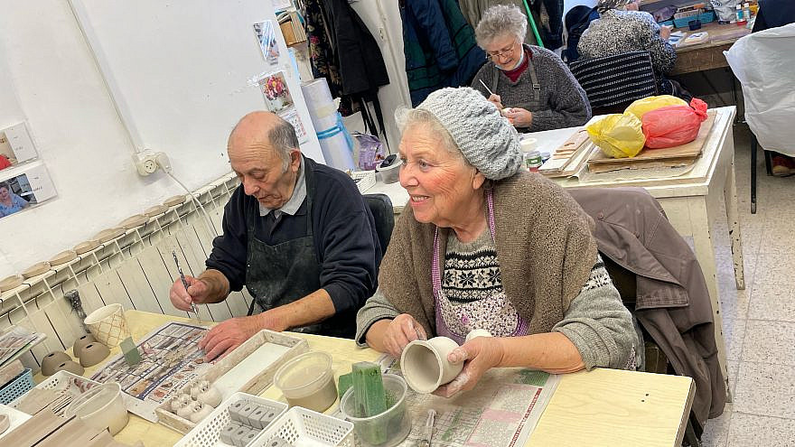 Yuri, 88, and Adele, 76, work in the Ceramics Workshop at Yad LaKashish in Jerusalem. Photo by Judith Segaloff.