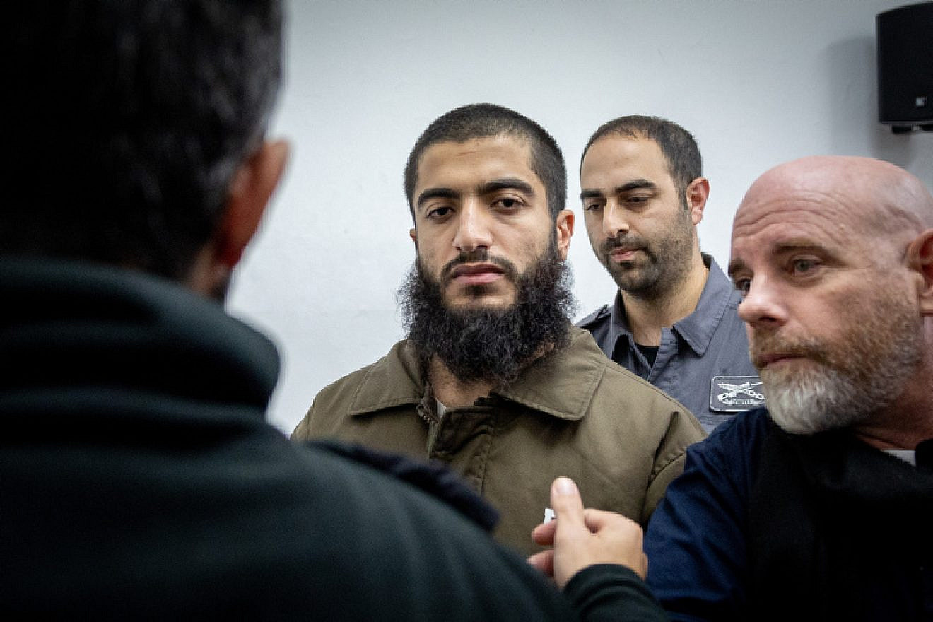 Accused terrorist Eslam Froukh arrives for a hearing at the Jerusalem Magistrate's Court, Dec. 27, 2022. Photo by Yonatan Sindel/Flash90.