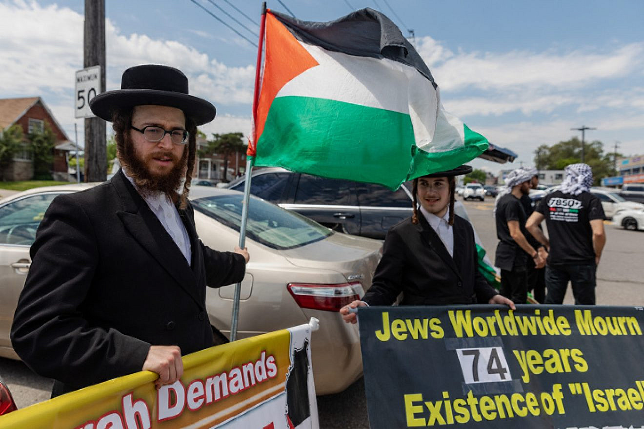 Ultra-Orthodox Jews belonging to the anti-Zionist Neturei Karta group attend a protest against the annual Parade for Israel in Toronto, Canada, May 29, 2022. Photo by Doron Horowitz/Flash90.