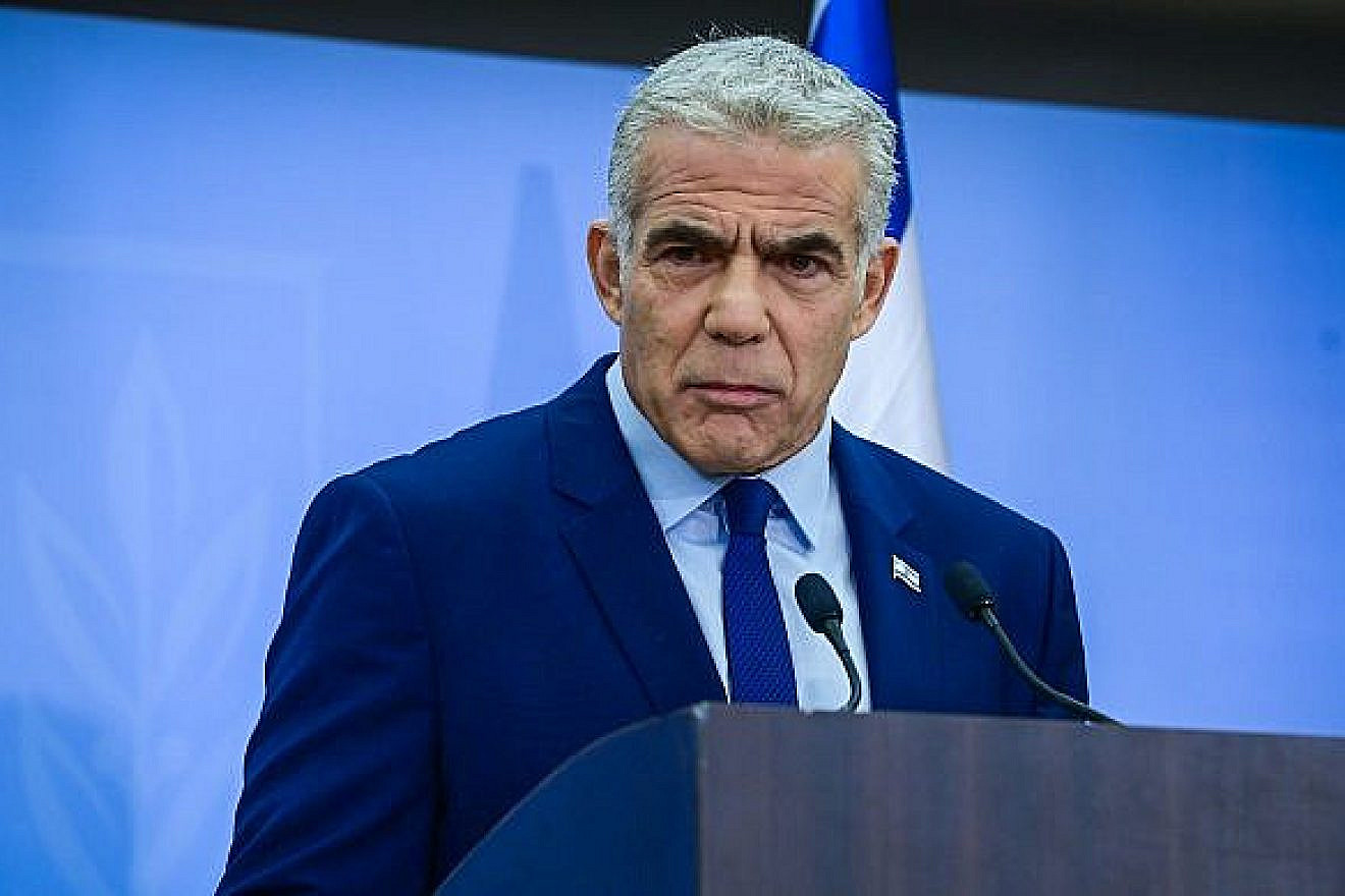 Outgoing Israeli caretaker Prime Minister Yair Lapid holds a press conference in Tel Aviv, Dec. 22, 2022. Photo by Tomer Neuberg/Flash90.