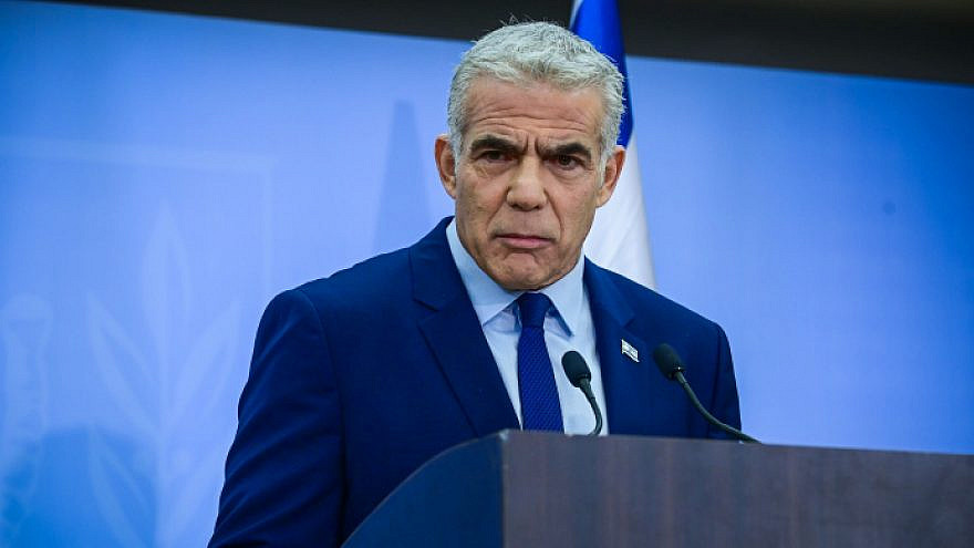 Outgoing Israeli caretaker Prime Minister Yair Lapid holds a press conference in Tel Aviv, Dec. 22, 2022. Photo by Tomer Neuberg/Flash90.