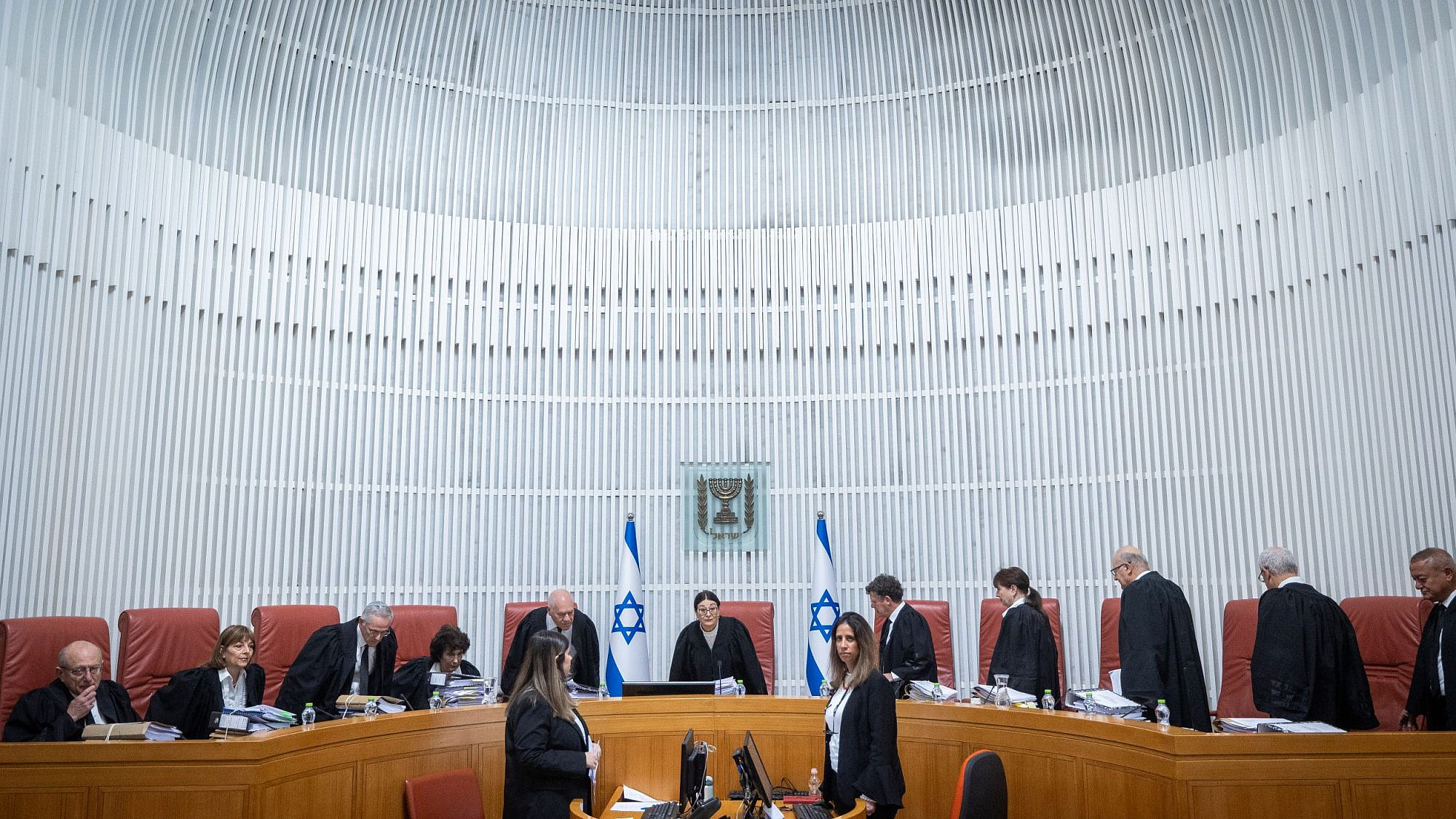 Supreme Court justices arrive for a hearing in Jerusalem on the appointment of Shas leader Aryeh Deri as a government minister, Jan. 5, 2023. Photo by Yonatan Sindel/Flash90.