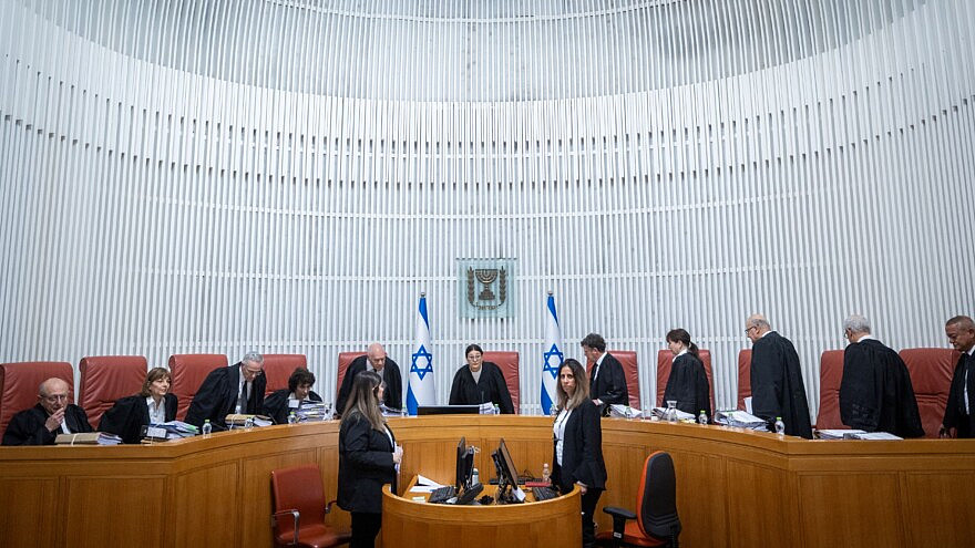 Supreme Court justices arrive for a hearing in Jerusalem on the appointment of Shas leader Aryeh Deri as a government minister, Jan. 5, 2023. Photo by Yonatan Sindel/Flash90.