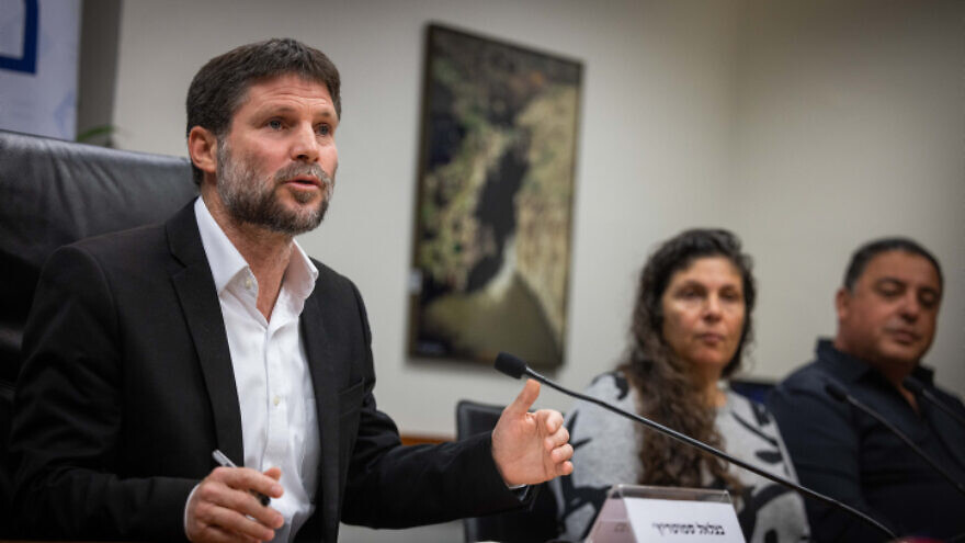 Minister of Finance Bezalel Smotrich holds a press conference with bereaved families in the Ministry of Finance in Jerusalem, Jan. 8, 2023. Photo by Yonatan Sindel/Flash90.