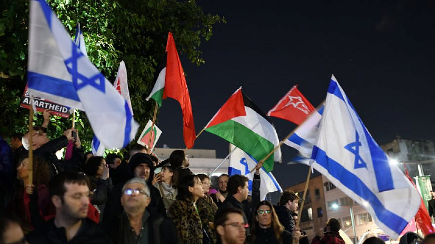 Palestinian flags waved at the rally against Prime Minister Benjamin Netanyahu's judicial reforms in Tel Aviv, Jan. 14, 2023. Photo by Gili Yaari /Flash90.