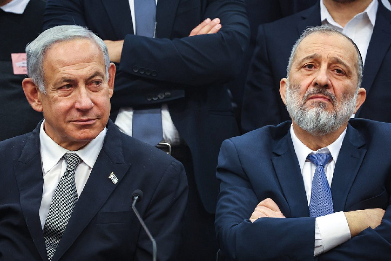 Israeli Prime Minister Benjamin Netanyahu and Shas Chairman Aryeh Deri attend a Shas Party faction meeting at the Knesset, Jan. 23, 2023. Photo by Yonatan Sindel/Flash90.