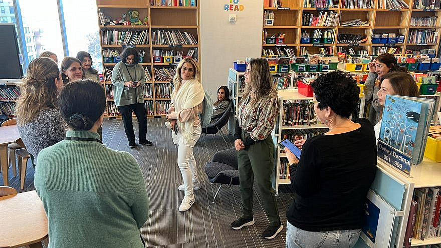 The Halleli progam participants visit the library at the Abraham Joshua Heschel School in Manhattan. Courtesy of TALI.
