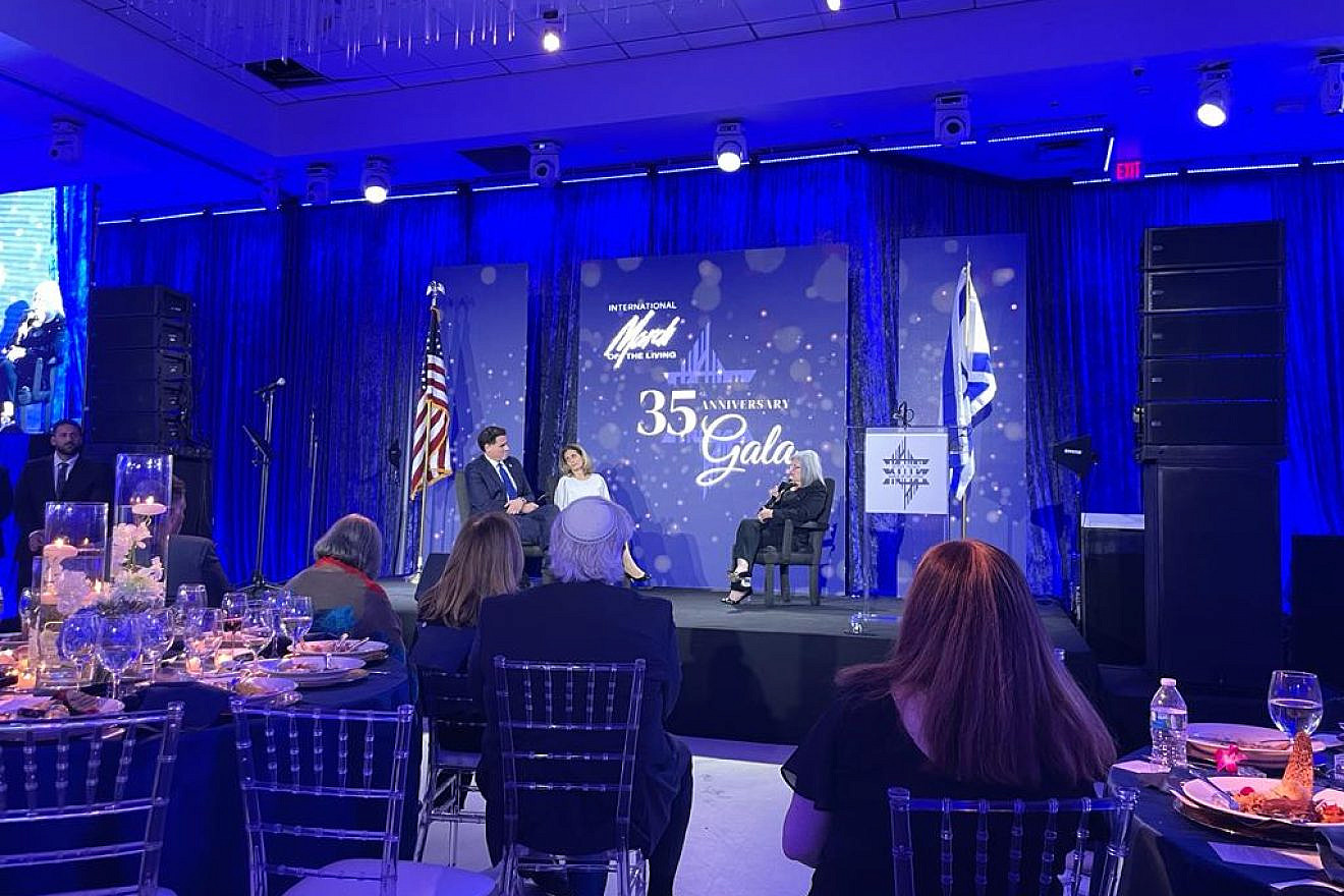 The International March of the Living honors former Chief Rabbi of Israel Yisrael Meir Lau and Israeli Strategic Affairs Minister Ron Dermer and his wife, Rhoda, at its 35th Anniversary Gala celebration in Miami, Florida, Jan. 10, 2023. Credit: Alex Traiman.