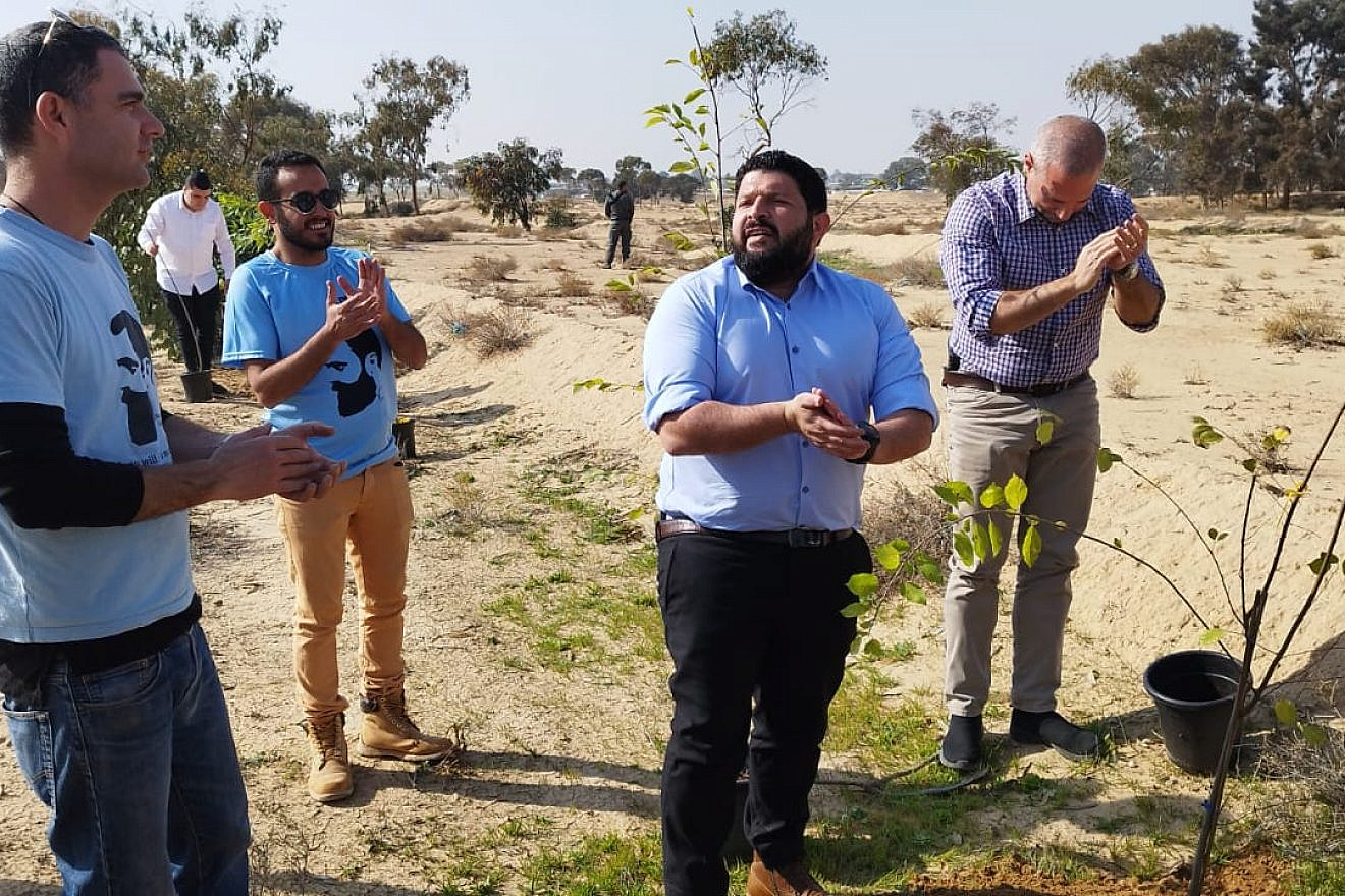 Im Tirtzu CEO Matan Peleg (left) and Otzma Yehudit MK Almog Cohen (center) at the tree-planting event in the Yatir Forest, Jan. 22, 2023. Courtesy.