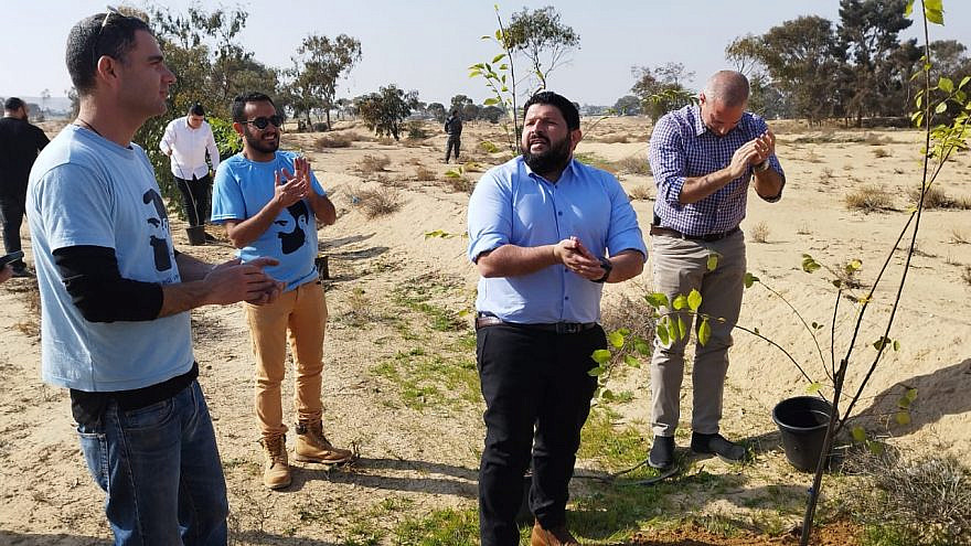Im Tirtzu CEO Matan Peleg (left) and Otzma Yehudit MK Almog Cohen (center) at the tree-planting event in the Yatir Forest, Jan. 22, 2023. Courtesy.