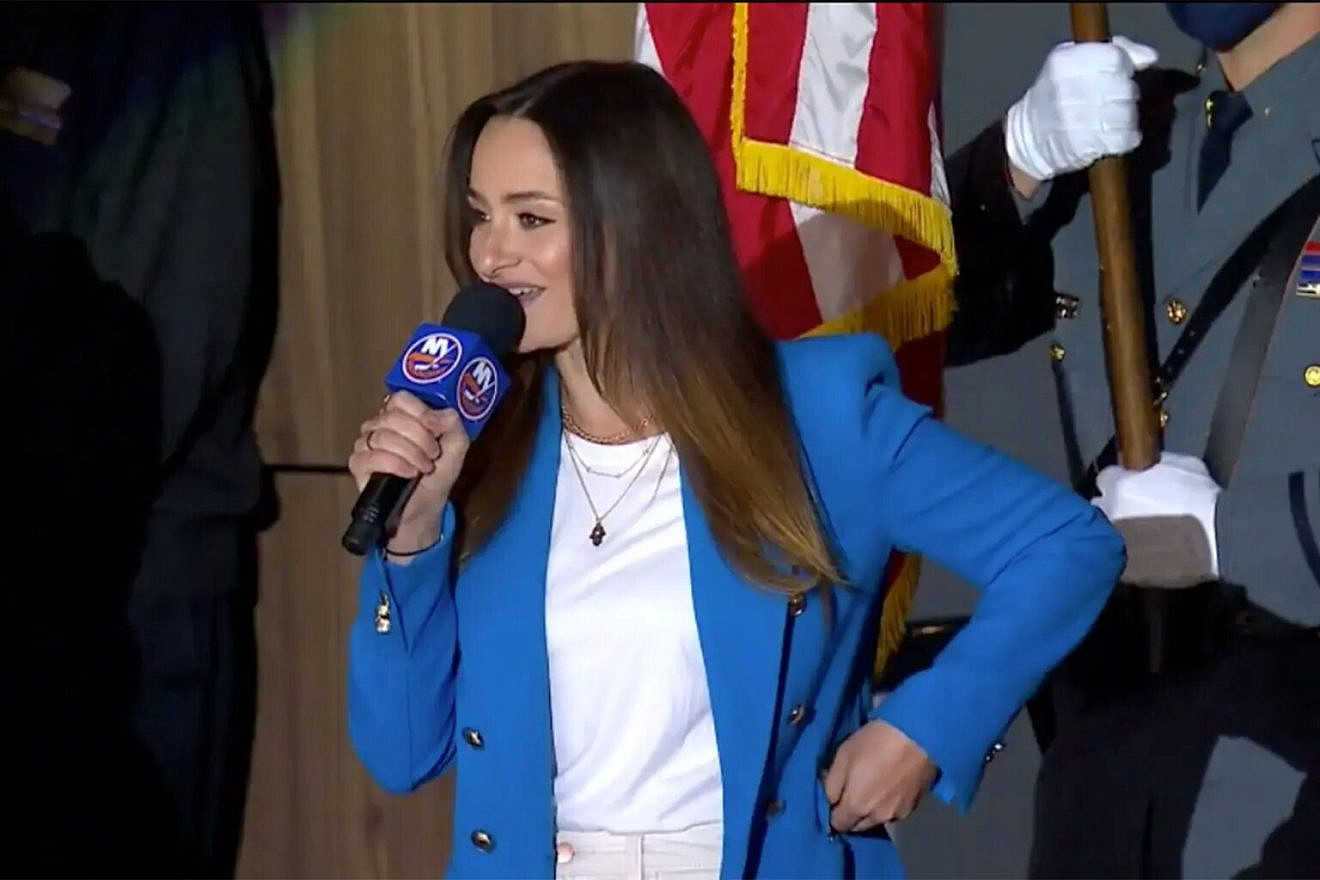 Nicole Raviv prepares to sing "The Star-Spangled Banner" before a New York Islanders playoff game at the Nassau Coliseum, June 9, 2021. Screenshot/NBCSN.