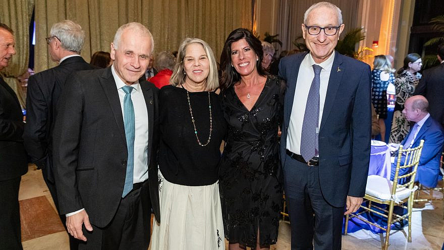 The 2023 Palm Beach Scopus Award Gala, held at The Breakers in Palm Beach, on Friday, January 13th raised $1.1 million for the Hebrew University’s Center for Computational Medicine in Jerusalem. Pictured at the event presented by the Southeast Region of American Friends of the Hebrew University (AFHU), (left to right)  Hebrew University President Asher Cohen; Stacy Mandel-Palagye; Chief Executive Officer Emerita Beth Asnien McCoy, who was the honoree, and HU Chancellor, Professor Menahem Ben-Sasson.