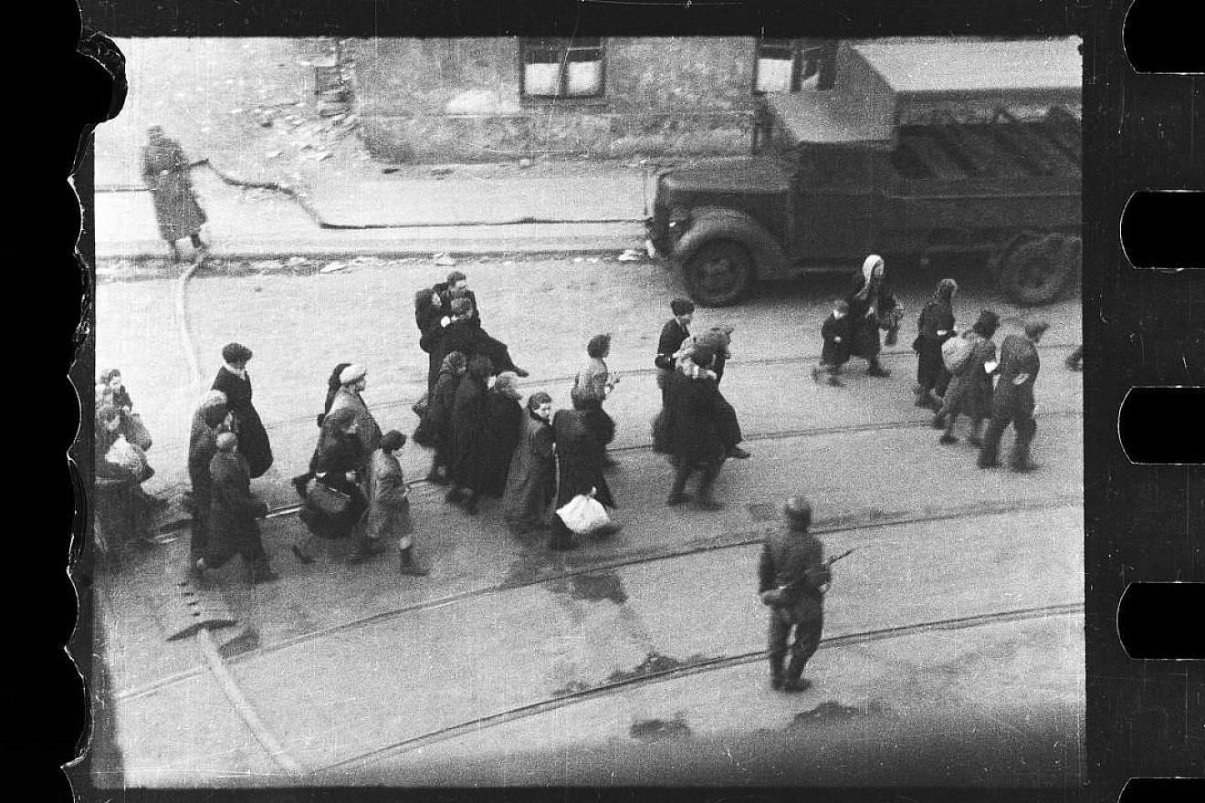 Jews in the process of being deported from the Warsaw Ghetto following the revolt of April-May 1943. From the family archives of Maciej Grzywaczewski, son of Leszek Grzywaczewski. Photo by Zbigniew Leszek Grzywaczewski. Credit: POLIN Museum.