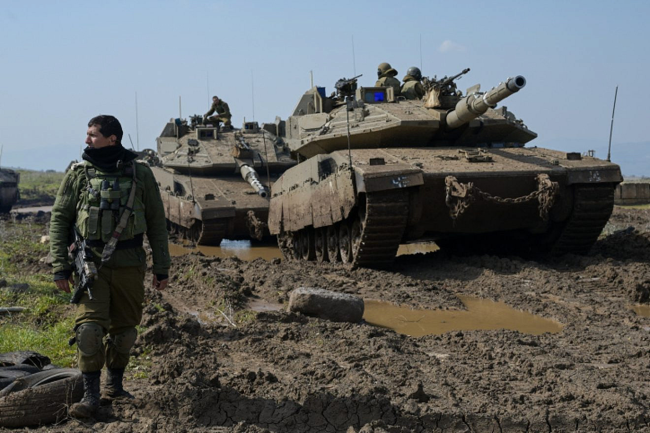 IDF Armored Corps soldiers drill near Moshav Aniam on the Golan Heights, Feb. 14, 2023. Photo by Michael Giladi/Flash90.