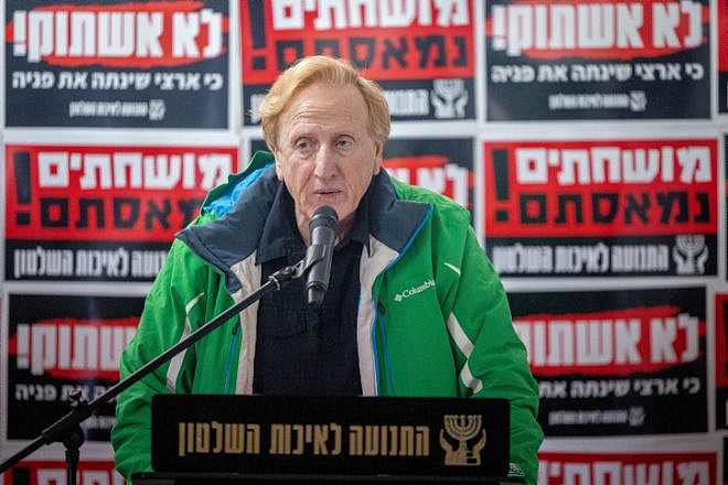 Eliad Shraga, founder of the Movement for Quality of Government in Israel, addresses a press conference at his group's protest tent against the proposed changes to the legal system, outside the Supreme Court in Jerusalem, Feb. 2, 2023. Photo by Yonatan Sindel/Flash90.