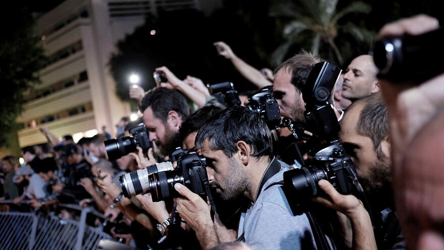 A group of photo journalists in Tel Aviv on Nov. 14, 2015. Credit: Tomer Neuberg/Flash90.