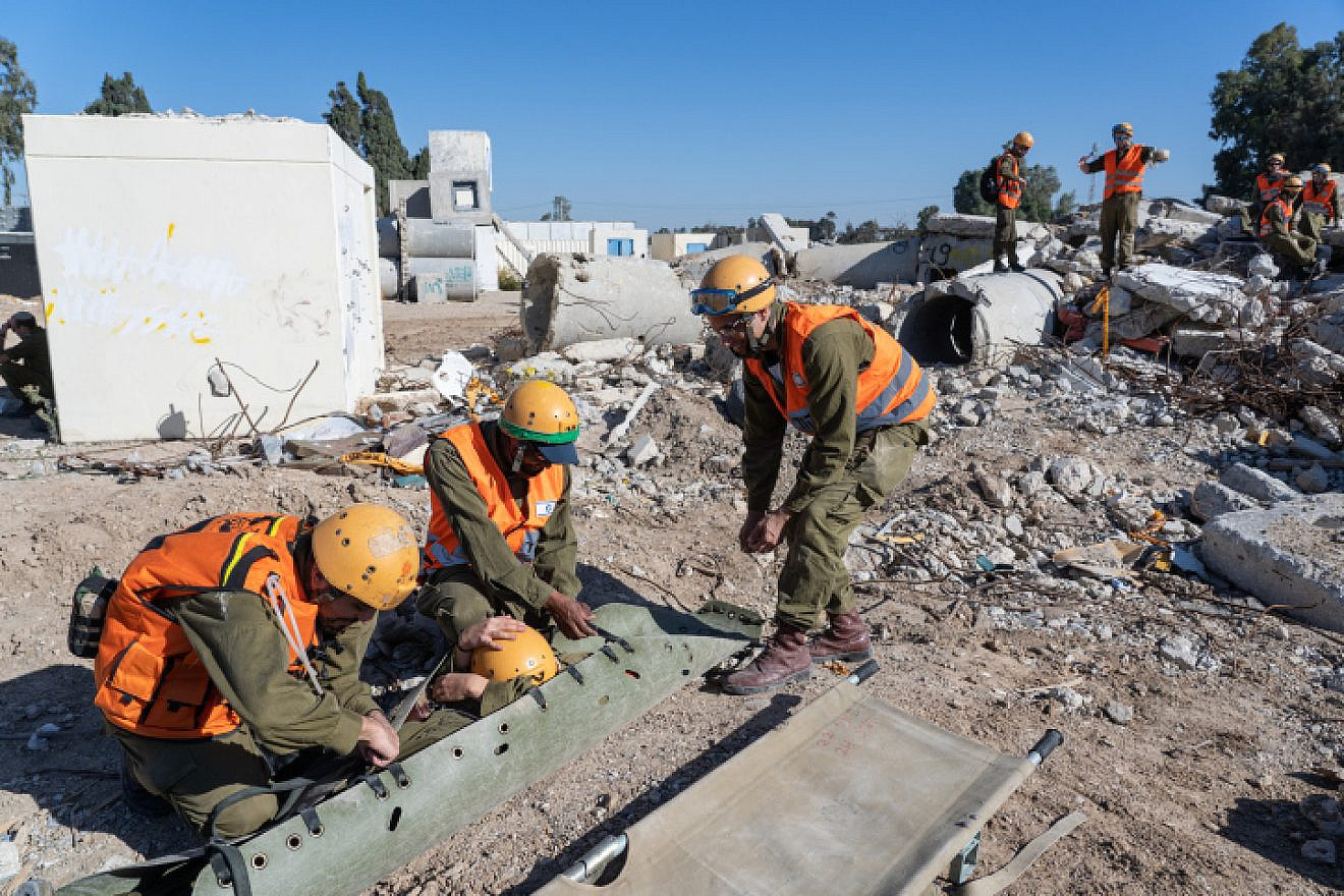 Members of the Knesset Guard, IDF Home Front Command, Israel Fire and Rescue Services and Magen David Adom participate in a drill near Ashkelon simulating response to an earthquake, Dec. 19, 2019. Photo by Yaniv Nadav/Flash90.