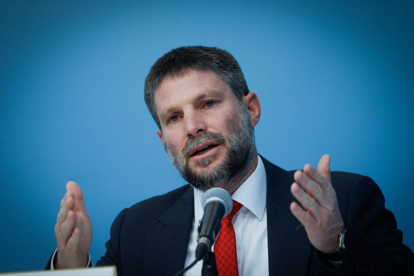 Israeli Finance Minister Bezalel Smotrich gives a press conference with Israeli Prime Minister Benjamin Netanyahu (unseen) at the Prime Minister's Office in Jerusalem, on Jan. 11, 2023. Photo by Olivier Fitoussi/Flash90.