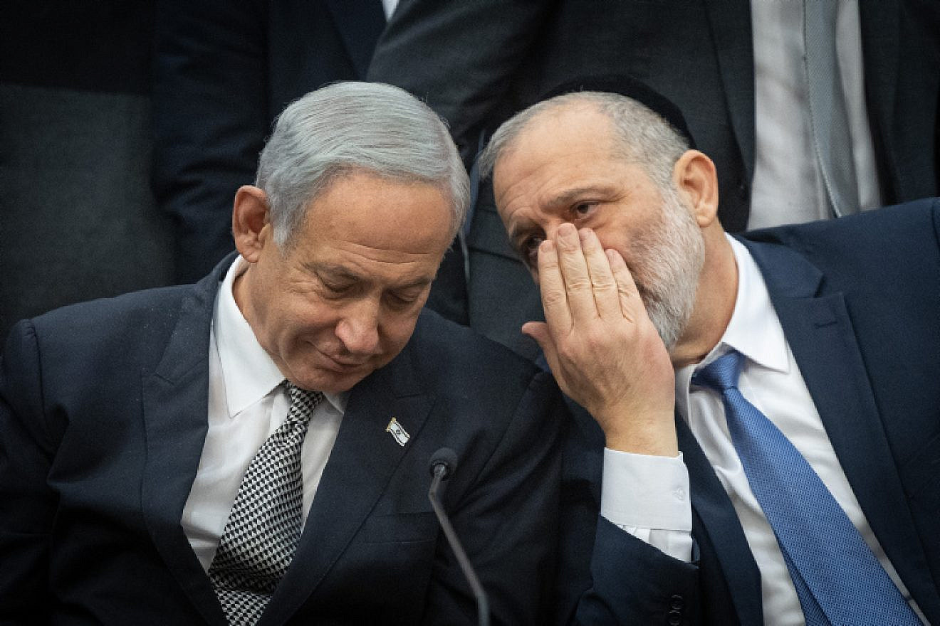 Prime Minister Benjamin Netanyahu and Shas leader Aryeh Deri during a Shas Party meeting at the Knesset, Jan. 23, 2023. Photo by Yonatan Sindel/Flash90.