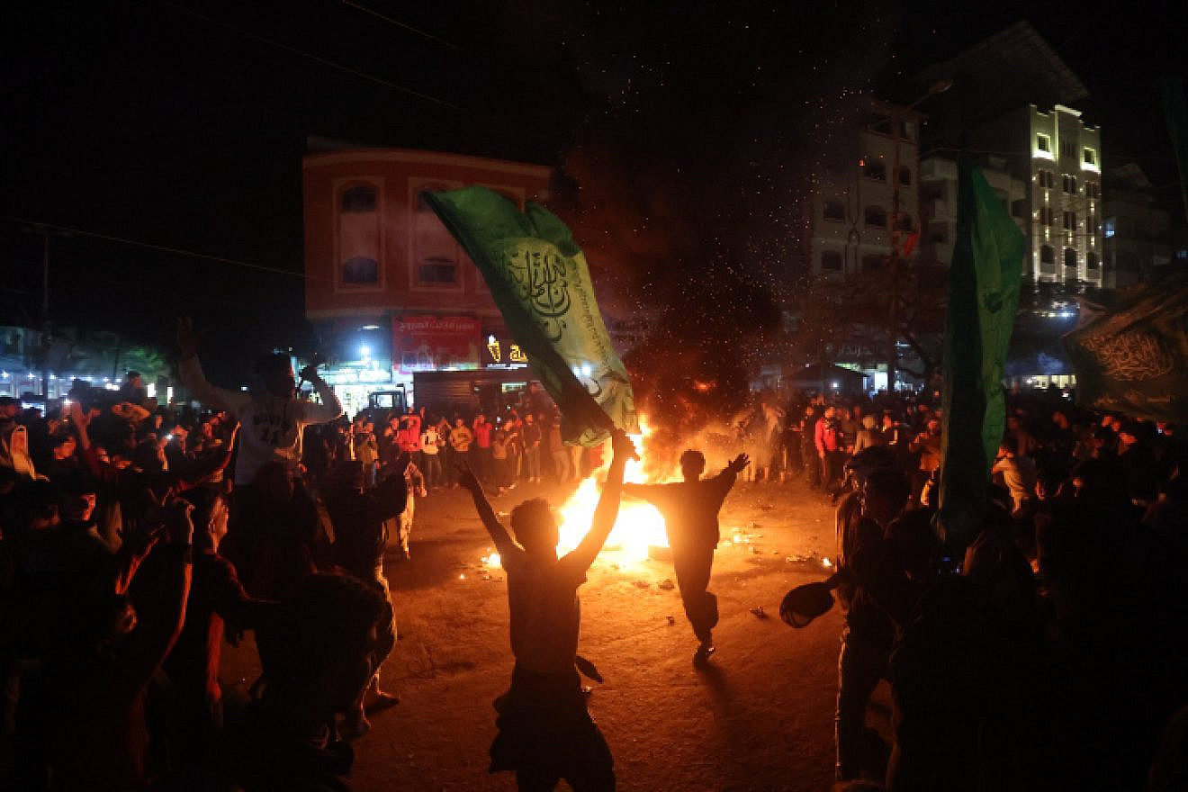 Palestinians celebrate in Gaza City following a deadly terror attack in Israel on Jan. 27, 2023. Photo by Atia Mohammed/Flash90.