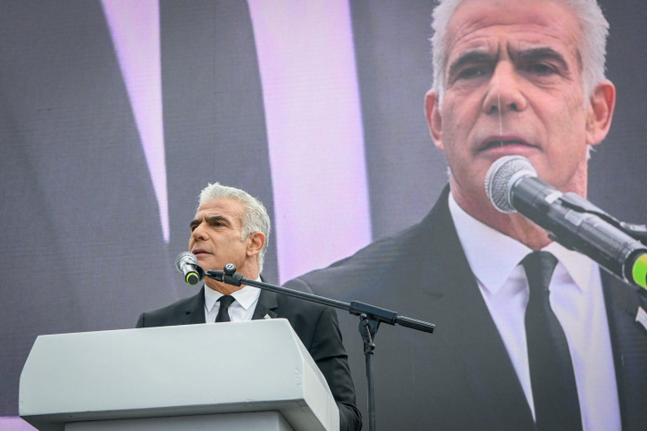 Opposition leader Yair Lapid speaks at a protest outside the Knesset in Jerusalem against the government's judicial reform plan, Feb. 13, 2023. Photo by Arie Leib Abrams/Flash90.