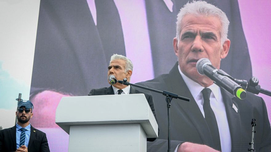 Opposition leader Yair Lapid speaks at a protest against the proposed judicial overhaul outside the Knesset in Jerusalem. Feb. 13, 2023. Photo by Arie Leib Abrams/Flash90.